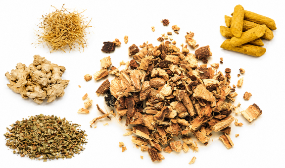 Dried roots, bark, ginger and turmeric pieces used in Ayurvedic preparation